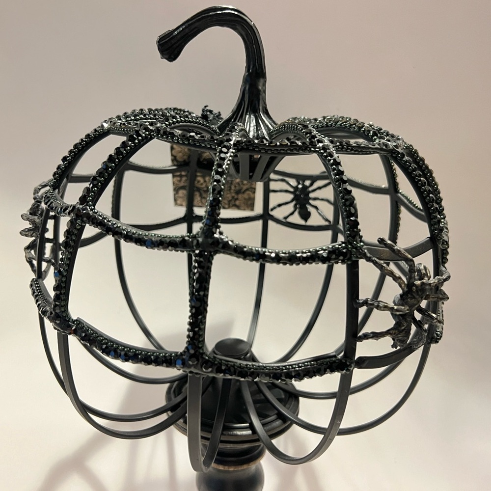 Pretty cool black rhinestone & metal skeleton Halloween pumpkin with spiders.